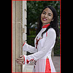 Vietnamese model in traditional dress shot outdoors
