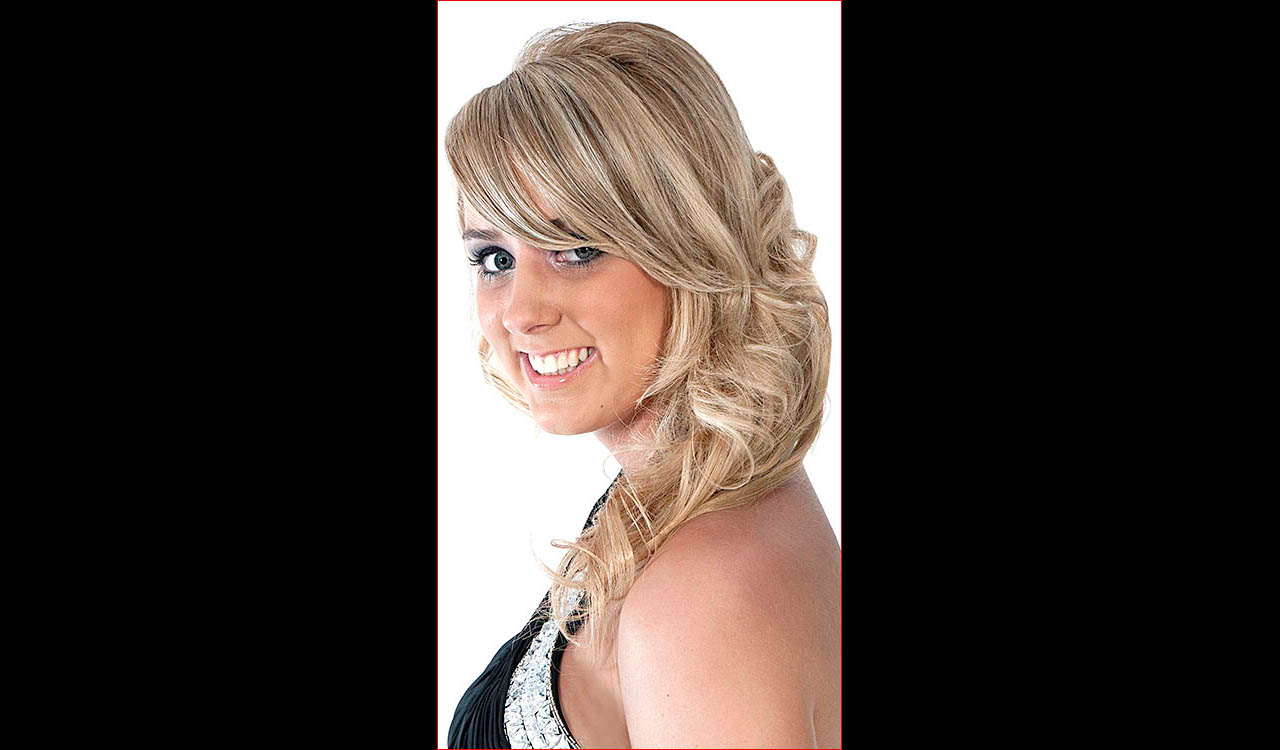Attractive model, blonde hair and black dress