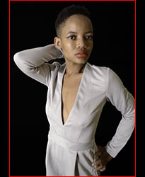 Model simbi wearing grey suit