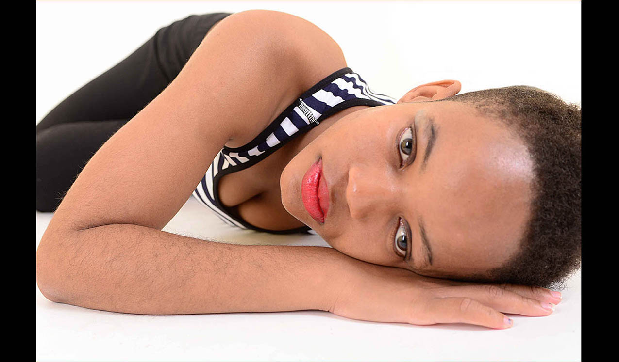 Simbi model wearing t-shirt and jeans